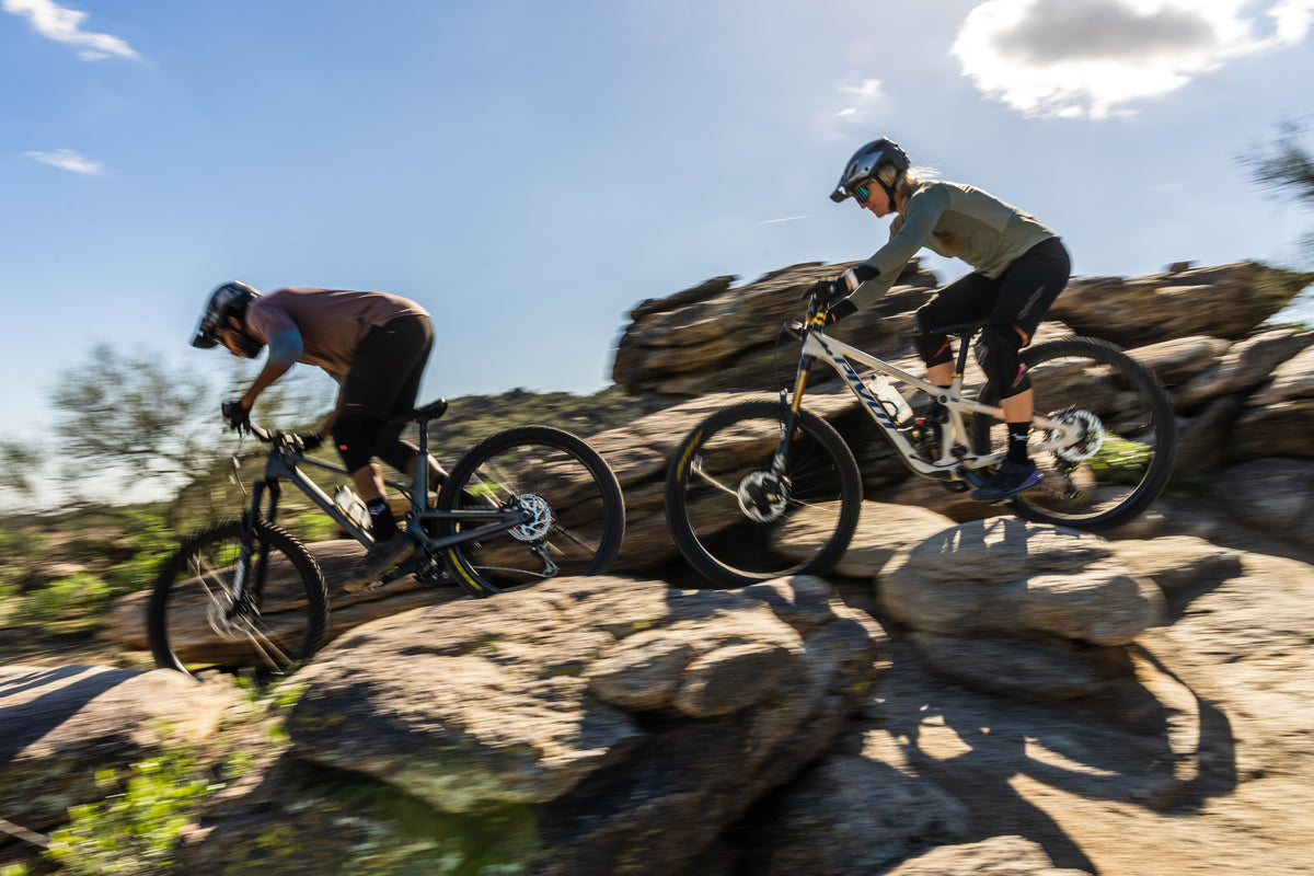 mountain bikers on rocks